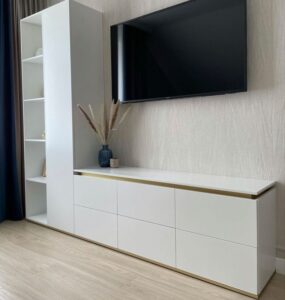 Sleek Wall-Mounted TV Panel with Floating Shelves