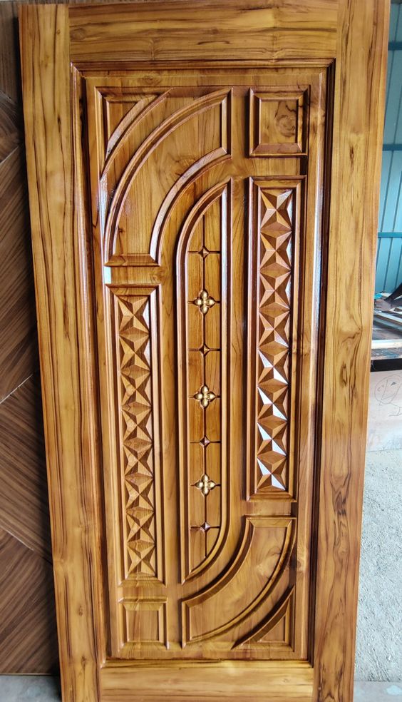 Carved Wooden Door with Floral Motifs