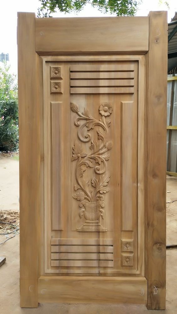 Carved Wooden Door with Floral Motifs