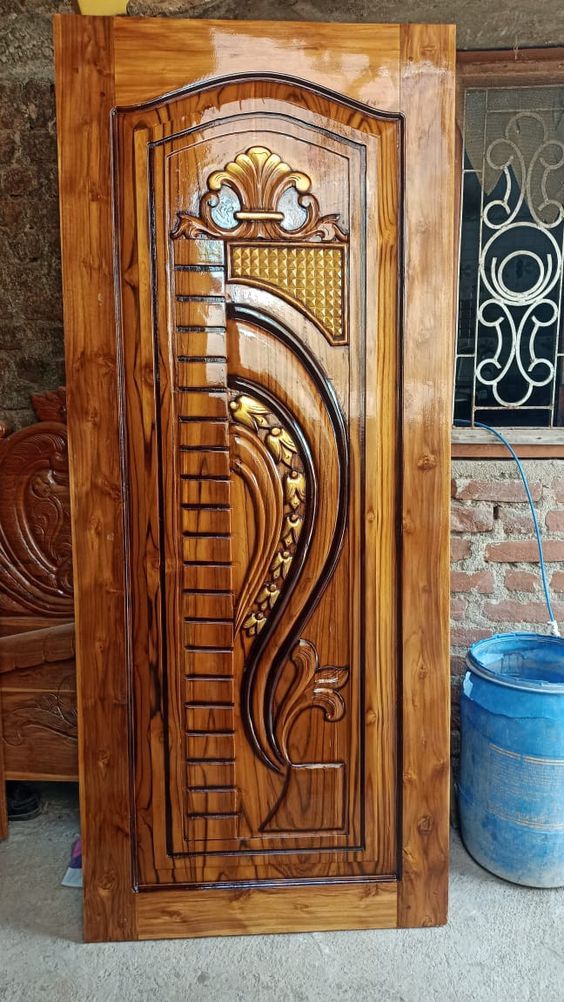 Carved Wooden Door with Floral Motifs