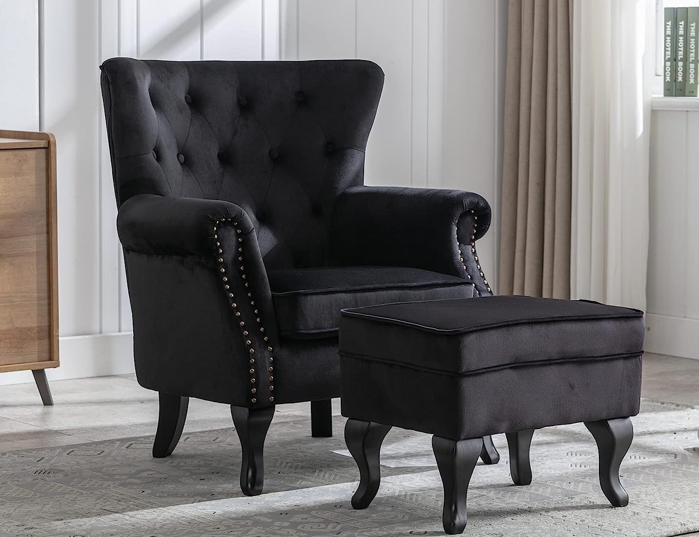 Unique Black Velvet Armchair with Armrest and a leg rest