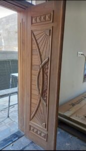 Carved Wooden Door with Floral Motifs