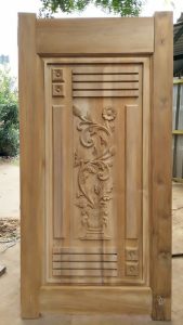 Carved Wooden Door with Floral Motifs